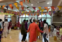 A festive gathering under colourful bunting at school