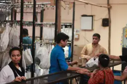 Volunteers serving food at the Sunday Feast